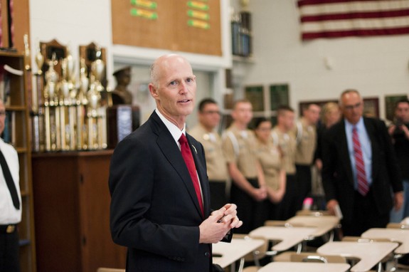 Gov. Rick Scott signs campaign finance and ethics bills into law. (Photo via Governor's Flickr)