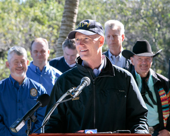 Gov. Rick Scott, pictured here in the Everglades, has denied that he prohibits DEP employees from using the terms "climate change" and "global warming." (Photo courtesy of Gov. Scott.)